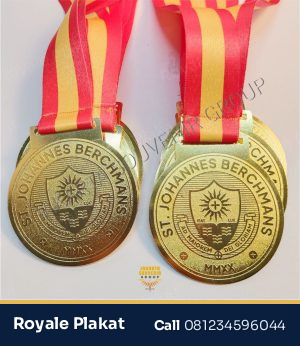 Medali Kuningan Champion